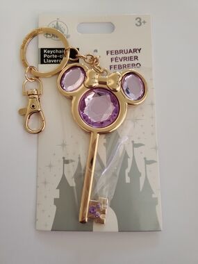 Disney Gold-tone Minnie Mouse Key Keychain with February Purple Gems. New